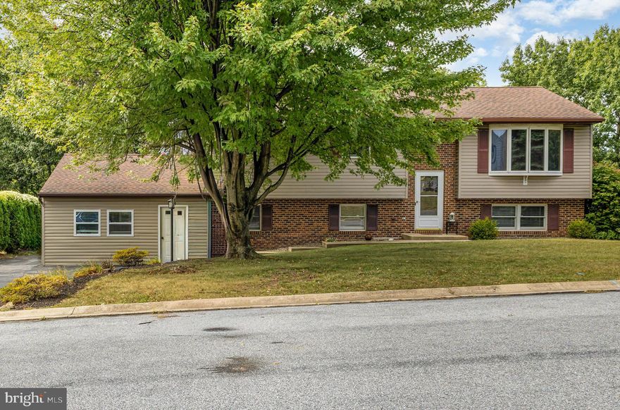 At no fault of the seller, this beauty is back on the market and available for you to call home!

Welcome to this beautifully renovated bi-level home, perfectly blending cozy modern updates with functional living space.
Step into the gorgeous foyer and find a bright, spacious living room filled with natural light. The remodeled kitchen showcases crisp white cabinetry, tiled backsplash, and updated appliances, seamlessly connected to the dining area. From here, walk out to your multi-level deck, ideal for entertaining, grilling, or relaxing by the pool. A second deck tucked into a wooded setting, creates a private retreat for peaceful outdoor enjoyment.
The massive primary suite offers comfort with plush wall-to-wall carpet, while the fully renovated lower level features luxury vinyl plank flooring, fresh paint, a full bath, and laundry. A converted garage adds even more living space, with separate entrances making the lower level perfect for an in-law suite or private guest quarters.
The level yard provides plenty of room for activities, and thoughtful updates throughout ensure this home is truly move-in ready.