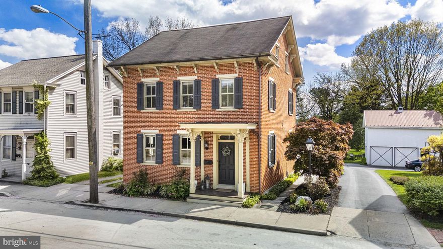 Stunning fully renovated home in the heart of historic Strasburg Borough—featured in the 2025 Holiday Home Tour! This 3BR, 1.5BA residence offers nearly 2,100 sq ft plus a finished basement, blending classic charm with top-to-bottom modern upgrades. Features include hardwood floors, crown molding, a designer kitchen (2021), beautifully remodeled baths (2023–2026), fresh paint throughout, and custom storage solutions. Enjoy a dual-zone HVAC system (2024), finished basement (2022), new carpeting (2021), and a fully roughed-in attic ready for expansion. Outdoor highlights include a hand-chiseled stone patio and refinished front porch. Oversized 2-car garage with new door (2021) and radon system already in place. Walk to local favorites like Speckled Hen and Strasburg Creamery—luxury, location, and lifestyle all in one.