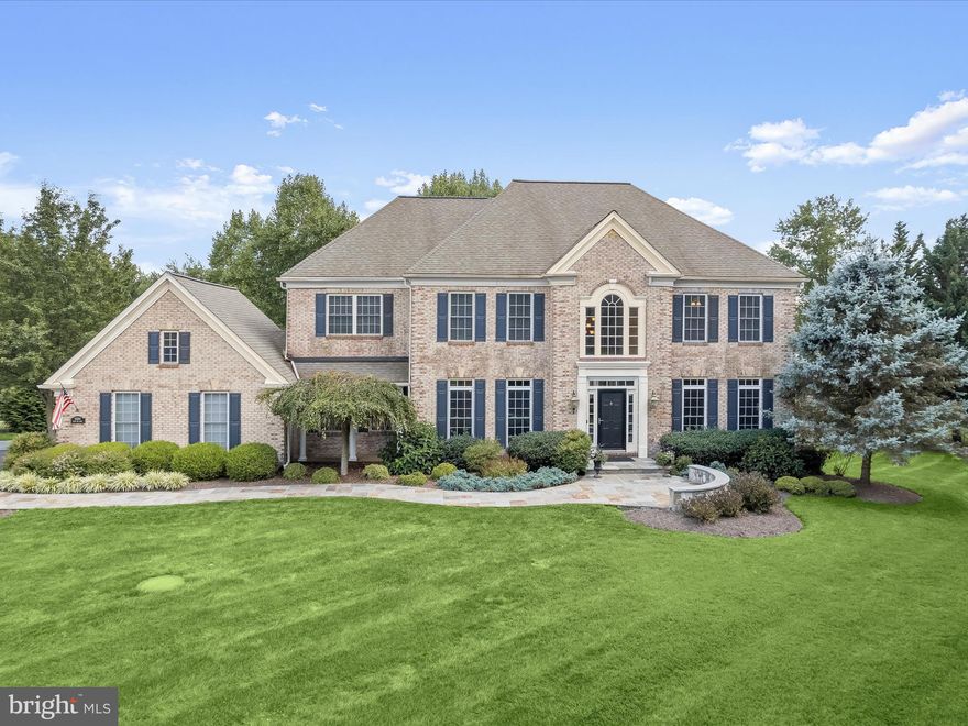 Welcome to 15204 Bucks Run Drive, a stunning estate nestled in the prestigious Wellington West, perched on a meticulously landscaped one-acre lot. This exquisite home boasts rich hardwood floors, soaring 9+ foot ceilings, detailed moldings, and custom built-ins that exemplify refined craftsmanship. The grand two-story foyer, flanked by formal living and dining rooms with classic moldings and hardwood floors, sets an elegant tone. The chef's eat-in kitchen is a culinary dream, featuring an expansive center island, granite countertops, cooktop, double wall oven, planning station, a second staircase, and a raised breakfast bar. The breakfast room and morning room offer breathtaking views of the landscaped grounds and provide access to the deck, perfect for morning coffee or evening relaxation. The family room, adjacent to the kitchen, is anchored by a pellet stove insert, creating a warm and inviting space for gatherings. The main level also includes a private office, a custom mudroom with a pet station, a laundry room, a powder room, and convenient garage access. Upstairs, the primary suite is a private retreat, complete with a sitting room, a walk-in closet, and a luxurious renovated en-suite bathroom. The en-suite features Quartz countertops, soft-close cabinetry, dual vanities, a glass-enclosed shower, and a slipper tub. An additional en-suite bedroom with a walk-in closet, along with two more bedrooms connected by a dual-entry bath, complete the upper level. The lower level is an entertainer's paradise, offering a game room, a wet bar with granite countertops, wine fridge, beverage fridge, a TV projector system, and access to a custom patio. A fifth bedroom, a full bath, and an exercise room with rubber flooring round out this incredible space. This estate is the epitome of luxury living, offering a perfect blend of elegance, comfort, and functionality. Welcome home.  OFFERS UPDATE: Respectfully requesting offers by Tuesday, August 6th by noon.