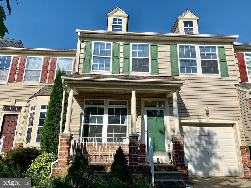 Beautiful move-in ready Porch-front townhome in College Hills .This 4 bedrooms and 3.5 bathrooms and one car garage. Freshly painted from bottom to top. New Hardwood floors throughout the main level and lower level. The bright living room connects to the spacious dining room. Take in the sights and sounds of nature from the deck with peaceful views of mature trees. The luxurious master bedroom with vaulted ceiling & walk-in closet and fireplace. Master bath with jetted whirlpool bathtub and double vanities. Spacious lower-level family room with fireplace & big windows. The fourth bedroom has a walk-in closet and a full bath. The sliding door leads to a flat backyard. Back to trees park & trails. Convenient commuter routes include I-95, I-695, I-70, 195, MARC Train & BWI Airport. Minutes to major thoroughfares, entertainment, shopping, restaurants, recreation, and more.