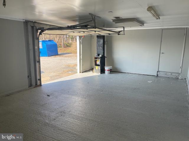CONVENIENTLY LOCATED GARAGE WITH UTILITIES INCLUDED! This spacious and clean garage is located behind 7510 Belair Rd. Dimensions are 26ft x 16ft, has heat, and we are working on getting electric installed. Perfect for someone looking for a small workspace or a contractor looking for storage. Located minutes from 695!
