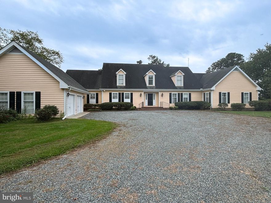 Situated on 2 acres in the sought-after North Point community, this waterfront Cape Cod offers over 5,400 square feet of space and sweeping views of the Tred Avon River. With  7 ft MLW at the private dock, it’s an exceptional opportunity for boaters seeking reliable deep-water access. The main level is highlighted by a waterfront primary suite complete with a walk-in closet and full en suite bath. The open living area with vaulted ceilings creates a spacious feel, while a screened porch and waterside deck invite you to take in the views. Upstairs, flexible space allows for additional entertaining or a custom retreat to suit your needs. The property also features a pool, mature landscaping, and a large garage with storage. Ready for its next chapter, the home offers buyers the chance to reimagine and personalize the interiors to match their own style and vision. Just minutes from both Easton and St. Michaels, this property combines convenience with privacy and remarkable water access—a rare opportunity on the Tred Avon. Property is being sold As-is.