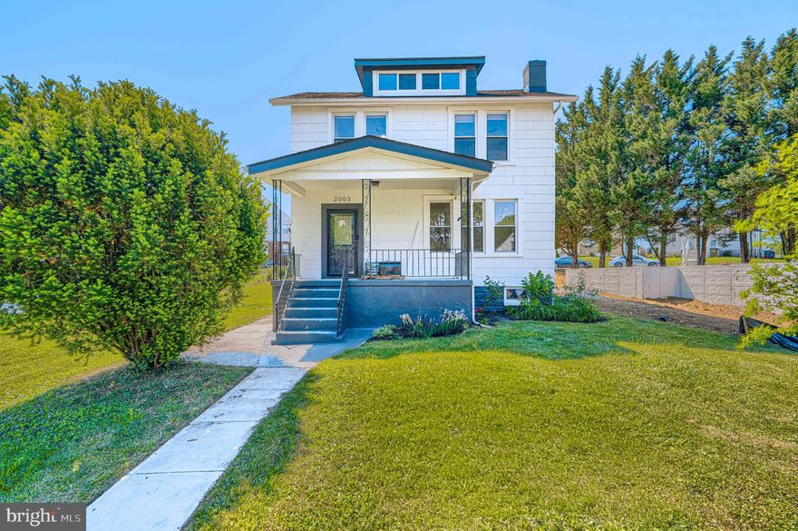 Charming renovation blending timeless character with modern updates in Gwynn Oak! A welcoming front porch invites you inside to beautifully refinished hardwood floors that flow throughout the first and second levels. The spacious living room features a decorative white brick fireplace flanked by custom built-in bookcases, creating a warm and inviting focal point. The dining room offers an additional custom built-in and opens to a stunning brand-new kitchen complete with white cabinetry, quartz countertops, and stainless steel appliances. A modern full bath adds style and convenience to the main level, while the mudroom off the kitchen provides easy access to the large backyard, perfect for entertaining, gardening, or relaxing outdoors. Upstairs, you’ll find three spacious bedrooms and a beautifully updated full bath. The finished attic provides incredible bonus space ideal for a playroom, home office, guest room, or additional living area. The unfinished basement includes the laundry area and offers abundant storage space. A perfect combination of charm, space, and thoughtful updates throughout!