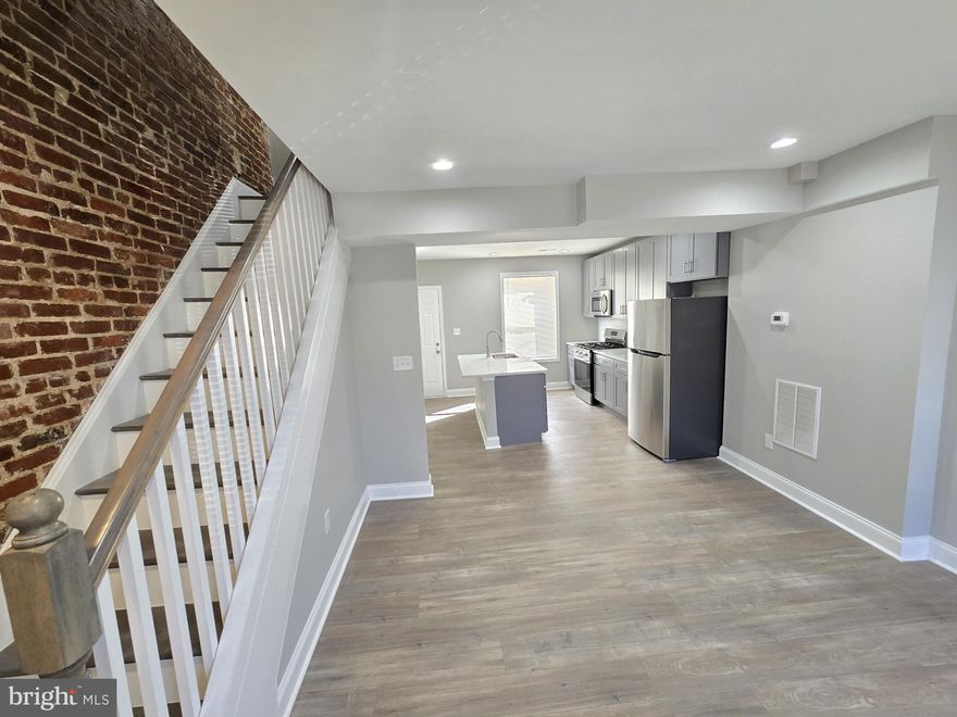 Welcome to this stunning, fully renovated home located in the heart of Baltimore, MD. This property boasts three spacious bedrooms and a beautifully updated full bathroom with ceramic tile detailing. The kitchen is a chef's dream, complete with a brand new stove, dishwasher, refrigerator, and microwave, all in sleek stainless steel. The kitchen also features a convenient island, soft close cabinet doors, and an eat-in area for casual dining. The open floor plan includes a separate dining room and living room, both with luxury laminate flooring and recessed lighting. The exposed brick adds a touch of urban chic to the modern aesthetic. The home also includes a washer/dryer for your convenience. Outside, you'll find a covered front porch perfect for relaxing, and a fenced backyard for added privacy. With every feature and amenity completely brand new, this home is ready to provide a comfortable and stylish living experience.
Application Qualifications: Minimum monthly income 3 times the tenant’s portion of the monthly rent, acceptable rental history, credit history and criminal history, which all must be verifiable. The application fee is $55 per adult which is non-refundable. They must submit their two most recent pay-stubs along with picture I.D.