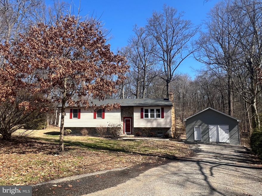 Welcome home to this fully renovated 5-bedroom, 2-full-bath residence with barn, situated on a rare 4.33-acre lot surrounded by mature trees and the tranquil setting of the West Branch Christina River in your backyard. Enjoy the privacy and natural beauty of this property while still being conveniently located near major routes including I-95, as well as Newark and the University of Delaware — all with no HOA.
From the moment you enter the main level, you are welcomed by a beautiful stone fireplace featuring a wood stove insert and blower to help circulate warmth throughout the home. Built-in shelving and a custom wood nook for log storage add both charm and functionality.
The kitchen is thoughtfully designed with stainless steel appliances, a built-in microwave, gooseneck faucet, and pantry for additional storage. Just off the kitchen, the dining room is filled with abundant natural light and features glass entry doors for added privacy when desired. A sliding door leads to a spacious rear deck where you can relax and enjoy peaceful views of the trees and the water across your private 4.33-acre oasis.
Down the hallway, you will find the first full bathroom and three well-sized bedrooms, including a primary suite with a private en suite bath.
The lower level offers exceptional flexibility and space, featuring a large open-concept entertainment area, laundry room, workshop, additional storage, and two additional bedrooms. The fifth bedroom includes a separate walk-out entrance, making it ideal for multigenerational living, guests, or potential apartment use.
Outside, two large patios provide the perfect space for entertaining or simply enjoying the serenity of your backyard retreat. The barn offers additional possibilities for storage, hobbies, or entertainment space.
Opportunities like this are rare — a fully renovated 5 bedroom home on 4.33 acres with water views, a barn, and convenient access to Newark, the University of Delaware, and major commuting routes.