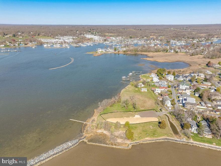 This exceptional waterfront property spans nearly 3 acres, graced with unobstructed views of the Bay and Rockhold Creek, offering a rare blend of expansive land and picturesque views. The property is currently in the process of subdivision into three private lots, providing a flexible opportunity for the new owner to either continue with the development plans or opt to retain the estate in its current expansive form. Envision constructing a bespoke dream home or creating a refined development, all within a 35-minute commute to both Washington D.C. and Annapolis.