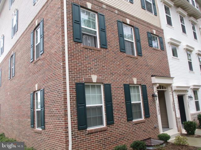3 bedroom 2.5 bath town home hardwood floors, granite counters, balcony, den, and 1 car garage.