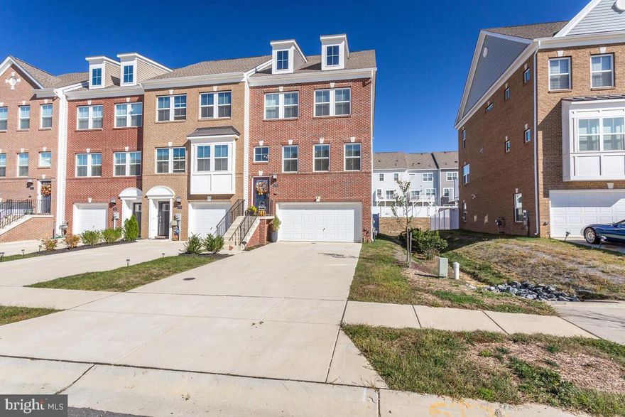 Stunning 4BR, 3.5BA End-Unit Townhome – Built in 2020 & Move-In Ready!

This beautifully updated end-unit townhome features a bright, open floor plan with elegant crown molding, recessed lighting, and new hardwood floors throughout. The gourmet kitchen boasts a large center island, stainless steel appliances, walk-in pantry, and flows into the dining area with access to a brand-new deck (2024).

Upstairs offers a spacious primary suite with tray ceiling, walk-in closet, and spa-like bath. Two additional bedrooms and a full bath complete the upper level.

The finished lower level includes an en-suite bonus room, full bath, and garage access—plus a walk-out to a fenced backyard.

Recent Updates:

    New hardwood floors throughout

    Fresh interior paint

    Epoxy-coated garage floor

    New deck (2024)

Don’t miss this turnkey gem!