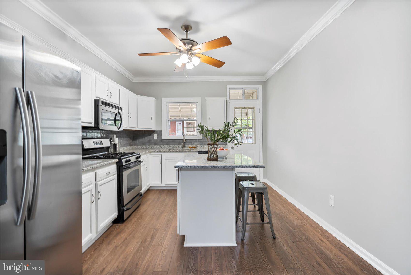 Come see what GreekTown has to offer! This newly remodeled 3 BR 2.5 BA home has all new kitchen with Granite & SS appliances, newly refinished original hardwood floors, new lower level bath, finished lower level, freshly painted throughout, and much more! You don't want to miss this one! Priced for quick sale! More pictures coming soon.