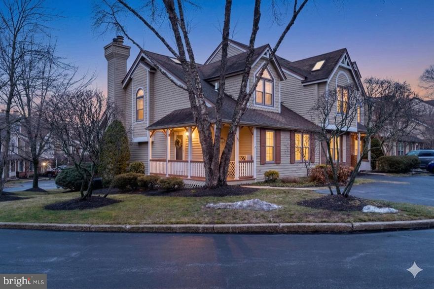 Welcome to 69 Main Street, a beautifully maintained end-unit townhome in the heart of Chesterbrook’s sought-after Main Street Village. Offering two bedrooms and a flexible layout, this home blends thoughtful updates with everyday comfort — including the rare advantage of a first-floor bedroom and full bath.

A welcoming front porch sets the tone before you step inside to a bright foyer with new hardwood flooring, a generous coat closet and a turned staircase. The main-level bedroom is spacious and versatile, ideal for guests, a home office or convenient single-floor living. Just steps away, the updated hall bath features tile flooring, a granite-topped vanity and a tub with full tile surround.

The kitchen is both stylish and functional, featuring stainless steel appliances, granite countertops, a pantry, brick backsplash and a breakfast bar that opens seamlessly to the main living space. The adjacent great room offers a warm and airy atmosphere with vaulted ceilings, skylights, ceiling fans, and a gas fireplace, while two sets of French doors lead out to a new deck, creating the perfect setting for entertaining or relaxing outdoors.

Upstairs, the primary suite feels like a private retreat with vaulted ceilings, skylights and a charming Juliet window overlooking the great room below. A cozy alcove offers an ideal spot for reading or working, and the large walk-in closet provides excellent storage. The updated ensuite bath includes double sinks with granite countertops, a soaking tub, a spacious walk-in shower with tile surround, and tile flooring.

The walk-out lower level adds valuable living space with a built-in workstation, wet bar, updated powder room, and a brand-new sliding glass door leading to a private patio. This level also includes a laundry room and two large storage areas.

Recent improvements by the current owners include $25,000 in updates, highlighted by fresh wall-to-wall carpeting, new hardwood flooring throughout the first floor, and new flooring and a brand-new sliding glass door on the lower level, making this home truly move-in ready.

Located within the award-winning Tredyffrin/Easttown School District, Chesterbrook is known for its miles of scenic walking trails, beautifully maintained green spaces and neighborhood parks. Enjoy easy access to the shopping, dining and culture of the Main Line, with convenient proximity to Routes 202, 422 and the Pennsylvania Turnpike for commuting to King of Prussia, Center City Philadelphia and beyond.