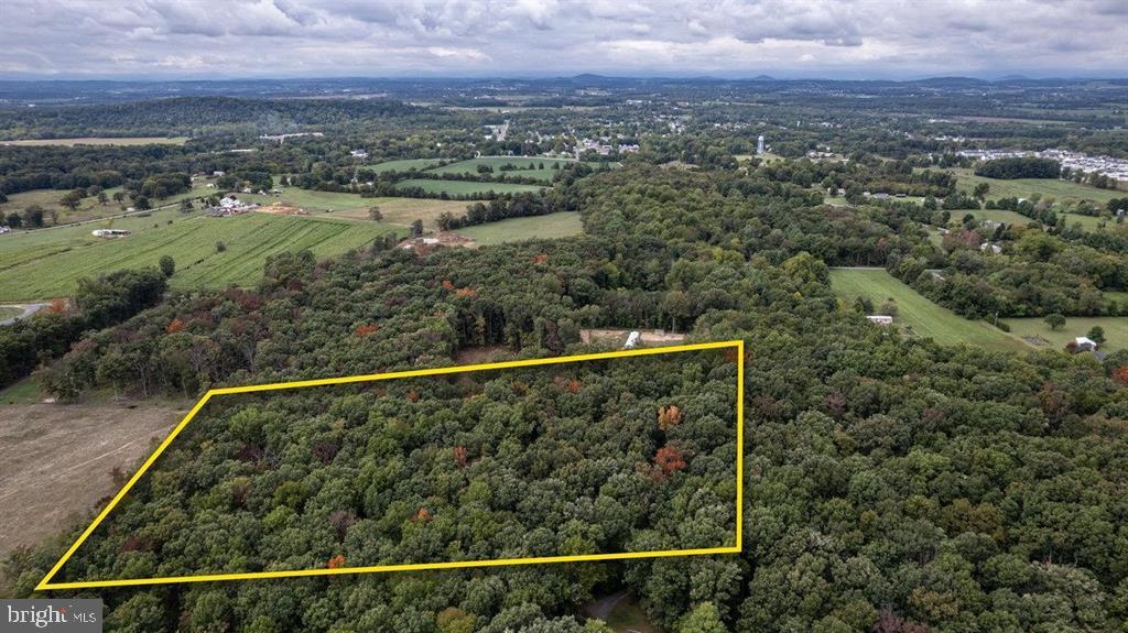 5 ACRES perfect for building with privacy and outside of the town of Grottoes limits. NO HOA, minimum neighbors with exceptions of plenty of deer. Wooded and private with a country road entrance. Build the perfect forever home in the middle of the 5 acres and have all the privacy ever needed within 5 miles of hitting interstate 81!!