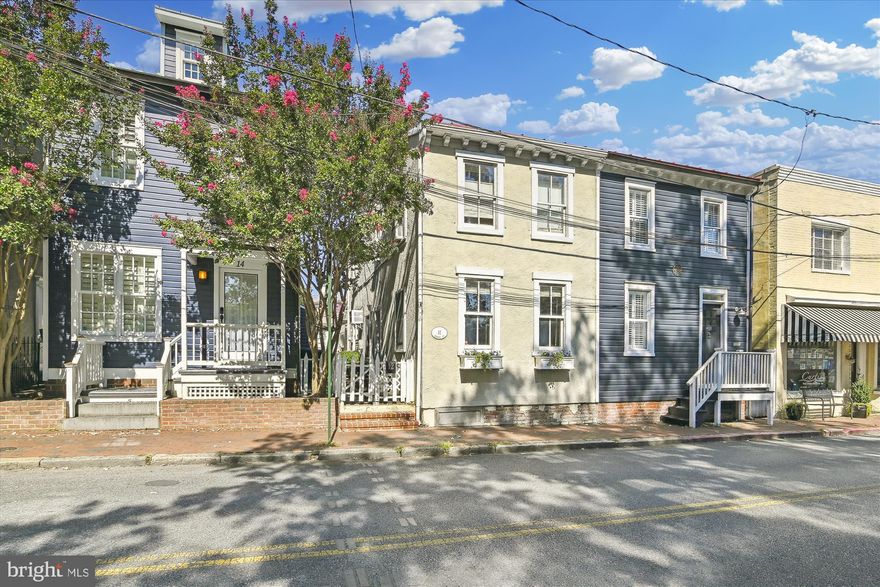 Location, location, location! This charming colonial row home is located just steps from City Dock and the United States Naval Academy.  Built in 1890, this home features a recently renovated kitchen, a comfortable living room and a separate dining area downstairs. Upstairs you'll find two true bedrooms, a smaller den/office space and a full bath. Current furniture and furnishings convey with closing, making this home move in ready and an easy weekend getaway.  Compact footprint requires little maintenance. A perfect fit for a Navy fan or family!