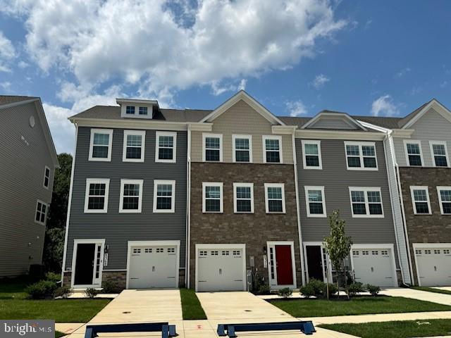 Don't' miss this opportunity. Close in 30 days. Seller help with closing cost. A one of a kind homesite with views of pool and gazeebo. Don't wait! Villages of White Marsh is one of Baltimore counties fastest selling communites. Filled with amenities. Community Pool, tot lot, walking trail, dog park. If you are looking for a brand new townhome that offers 3/4 bedrooms, 3.5 baths, 1 car garage with remote control and EV ready the Villages of White Marsh is for you. Your friends and family will be greeted by an open foyer and finished lower level and bath. Main level floor plan with 9 ceilings and crown molding. The kitchen is a dream! The modern WHITE cabinetry enhance the stainless-steel appliances, large center kitchen island, granite countertops, accessible pantry, recessed lighting. Your guest will have easy access to powder room on the main level. You can continue the party outside on your 10 by 12 rear deck. Guest will be equally impressed with the washer and dryer hook up included on the second floor. Two generous bedrooms with a hall bath and linen closet. The separate Owner's suite features a walkin closet and spa like bath with elevated dual vanities and granite tops. The 12 by 12 ceramic floor and wall tile will top off your morning routine. The Lafayette at White Marsh makes living the good life easy.