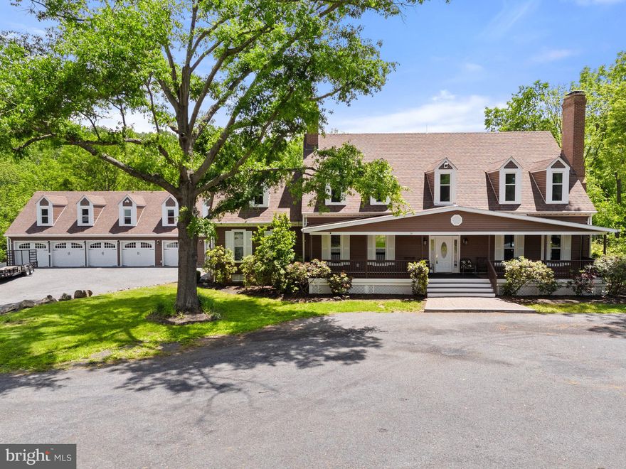 Privacy, convenience and an abundance of wildlife envelop this 44-acre property just minutes east of historic Middleburg, Virginia. The land offers open fields, significant woodlands, a shared pond, and nearly 1/3 mile of Little River which  traverses the property. The spacious home with over 6,400 sq. ft. of living space has been completely renovated and is available immediately. In addition to the residence, there is an attached 6 car garage, a 50’ x 90’ workshop/extra garage or party barn, a 24’ x 40’ barn ideal for stalls or equipment, and there may be potential for an auxiliary dwelling up to 2500 sq. ft. 

A wide front porch leads into the two-story center hall foyer. To the right one has the option of having a first-floor bedroom suite or library and to the left a gracious dining room which is open to the kitchen. The dining room features a wood burning fireplace and the kitchen is equipped with a wood stove. The completely new and spacious chef’s kitchen features tremendous workspace, a large island and Bosch appliances. Open to the double family room, also with fireplace, sunroom, and dining room, the kitchen serves as a wonderful hub providing an excellent flow for entertaining. This entire area features a high end LVP/waterproof flooring which was chosen to provide a good look and ease of care; it is wonderful if you have dogs! From the sunroom one has access to the large deck and koi pond. From the deck one has easy access to Little River. 

The upper level, in addition to bedrooms, features a laundry room, home theatre and 2 bonus rooms with full bath above the garage. The area above the garage can also be accessed from stairs at the back deck.

Convenient to Rt. 50 between Middleburg and Aldie, this location offers easy access to Dulles International Airport. The tremendous privacy and the terrain is ideal for someone who enjoys being out of doors, but not too far from businesses and shopping! In checking with Loudoun County there does seem to be good potential for an auxiliary dwelling up to 2,500 sq. ft. with its own well and septic, but please do your own homework.

Check the Documents section for floor plans and a list of Improvements.