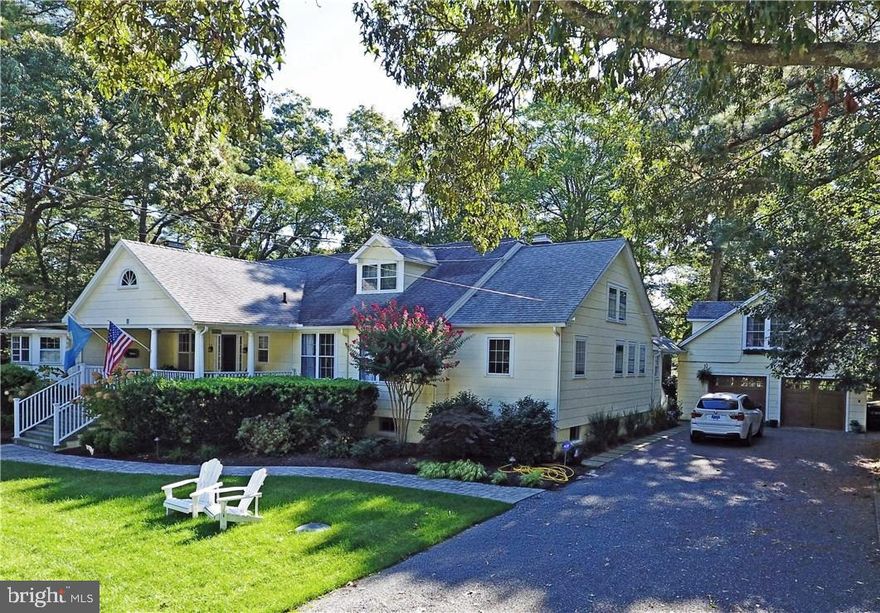 Grand Rehoboth Cottage first built on Lewes Beach and moved to Rehoboth circa 1949.  2.5 lots (125x100) also offer DEVELOPMENT OPPORTUNITY in The Pines section of North Rehoboth, this home and guest cottage offer many possibilities. The main house starts with a welcoming front porch leading to a sprawling residence with 4 BRs & 3 updated baths (2BR are on the main level). Hrdwd floors are featured throughout including the two upstairs BRs. Lots of light and loads of charm fill the LR, office, updated kit w/ butlers pantry, fam rm, DR and BRs.  A large 3 season porch with wet bar runs the width of the rear of the house and overlooks a beautifully landscaped yard.  2 wood burning fireplaces help you enjoy the home in the winter months as well--one in the LR and the other in the basement Family Room. The basement  also has a huge Rec room with pool table, laundry and lots of storage.  Over the two car garage is a cute guest cottage with,BR, kit and bath ready to update to your tastes.