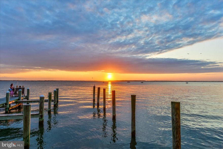 BEAUTIFULLY UPDATED  2 Bedroom, 2 Bath Condo with EXPANSIVE BAY VIEWS & BREATHTAKING SUNSETS! OWNERS HAVE USED OF THE BOAT SLIPS FOR THE SEASON WHEN AVAILABLE & BOAT STORAGE ON THE OFF SEASON! 
Unit is located on the 2nd floor in the B Building, which offers easy access to either the stairs or the elevators! UNIT IS #53 / 2ND FLOOR
Welcome to your waterfront escape! This stunning 2-bedroom, 2-bath condo offers unmatched panoramic bay views and gorgeous nightly sunsets right from your spacious private deck—perfect for morning coffee or evening happy hour. Large outdoor storage closet keeps all your beach accessories out of site. 
The unit has been tastefully updated throughout, featuring a new hot water heater, HVAC system, updated kitchen, flooring, modern bathrooms, and newer sliding glass doors that frame the water views beautifully.
Located in an immaculately kept building with a strong reserve fund, this property offers peace of mind and long-term value. Residents enjoy access to a bayfront outdoor pool, the perfect spot to cool off after a day on the water, as well as boat slips and secure storage for personal watercraft when you're away.
Enjoy an active coastal lifestyle with canoeing, kayaking, paddleboarding, and boating just steps from your door—and when you're ready for the ocean, you're just a short walk to the beach!
This unit is currently not a rental, but with its desirable location, amenities, and move-in ready condition, it has excellent income potential for investment-minded buyers.
Don’t miss your chance to own this serene waterfront gem—schedule your private tour today and experience all that bayfront living has to offer!