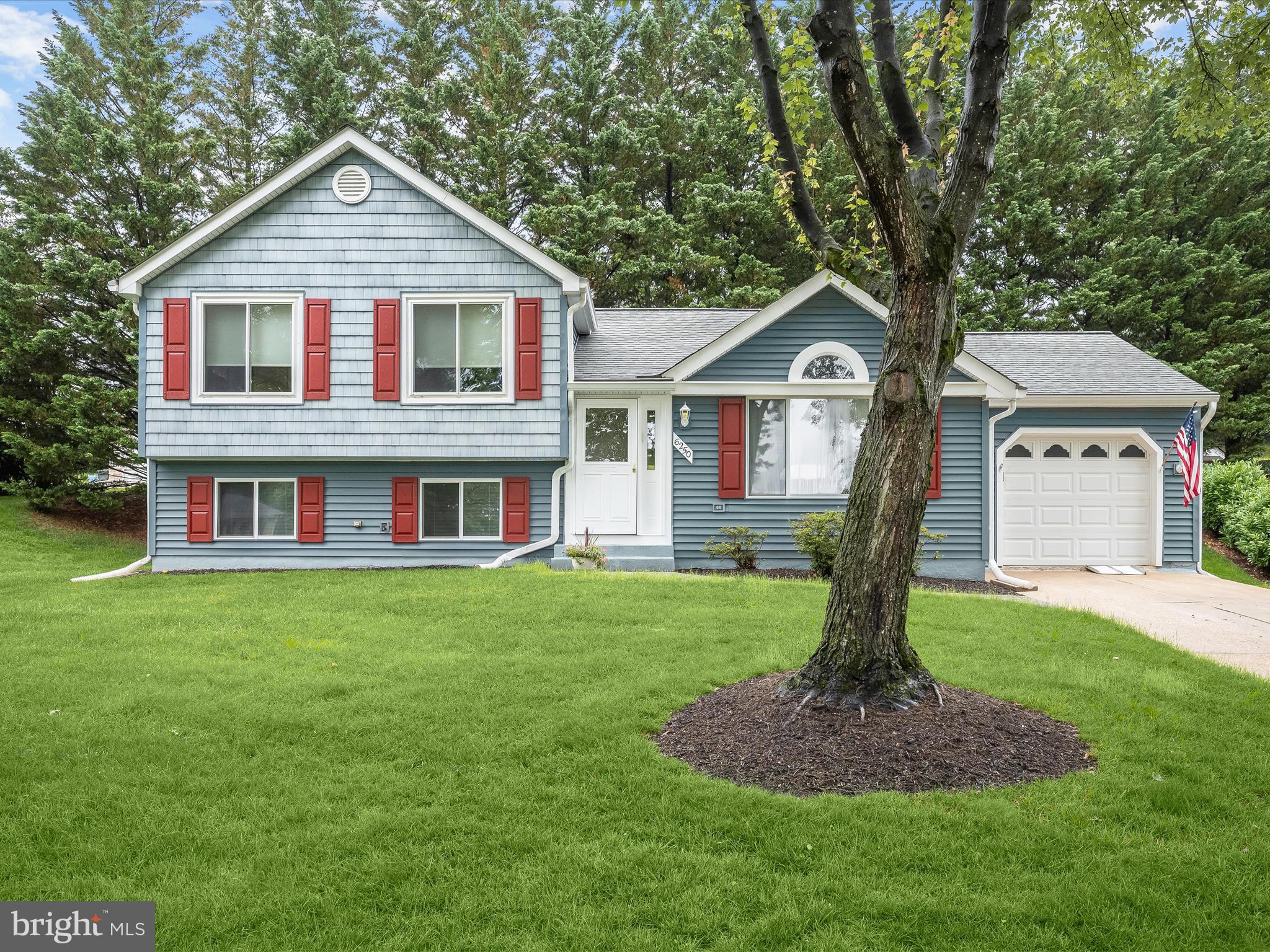 Discover this charming split-level home located on a quiet cul de sac in a well-established Howard County community filled with many original homeowners. The neighborhood offers a strong sense of community. Step inside to find an inviting open concept living, dining, and kitchen area with vaulted ceilings. The living room is filled with natural light, thanks to its elegant Palladian window, while the dining room offers easy access to the deck through a convenient sliding glass door. This level also includes direct entry from the 1-car garage. On the upper level, you’ll find 3 comfortable bedrooms, including a primary bedroom with a walk-in closet. The updated full bath shines with granite countertop, updated lighting, stylish flooring, and a custom-built storage cabinet. Downstairs, a spacious family room with built-in bookcases provides additional space for relaxation or gathering, alongside a convenient half bath, laundry area, and utility room with extra storage. Outside, enjoy a private deck and a lovely, secluded backyard perfect for relaxation or entertaining. An active HOA helps keep the community looking its best. The home is located just minutes from major commuter routes, BWI Airport, and Fort Meade. This home has been well maintained by its original owners and includes smoke detectors updated in 2024, a new HVAC Outdoor Carrier unit in 2023 (with annual maintenance by Arundel Heating & A/C), a 30-year roof installed in 2010 (with an inspection and power washing this year), a water heater replaced roughly 10 years ago, updated copper plumbing, maintenance-free siding, oversized gutters with gutter guards, a bath updated 7 years ago (with new flooring, lighting, and countertop), and convenient gas lines and high-speed internet (Verizon and Comcast) available.