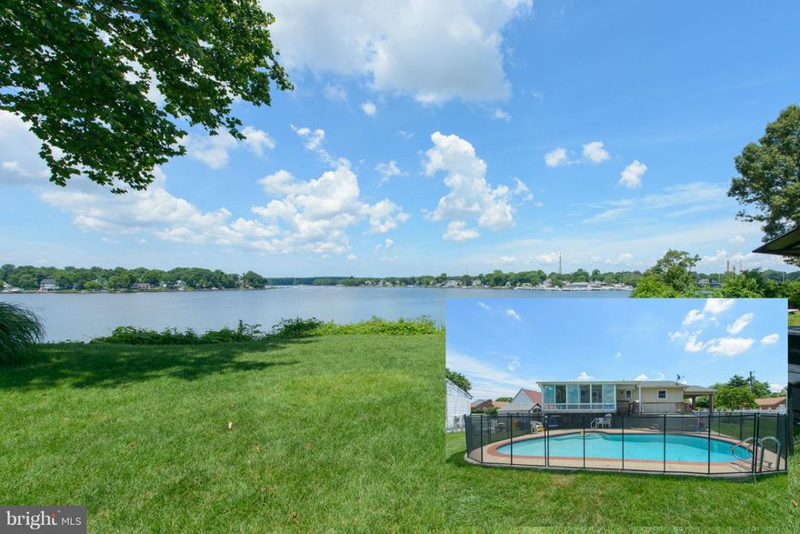 Amazing waterfront views from the enclosed rear porch overlooking your inground pool.  This is a great home for entertaining! Host friends in your fully finished lower level with recreation area, family room and bar, or have them all gather outside around the pool & in your large yard. Hardwood floors throughout main level. Community has beach, playground, pier and ramp. Property is non-riparian