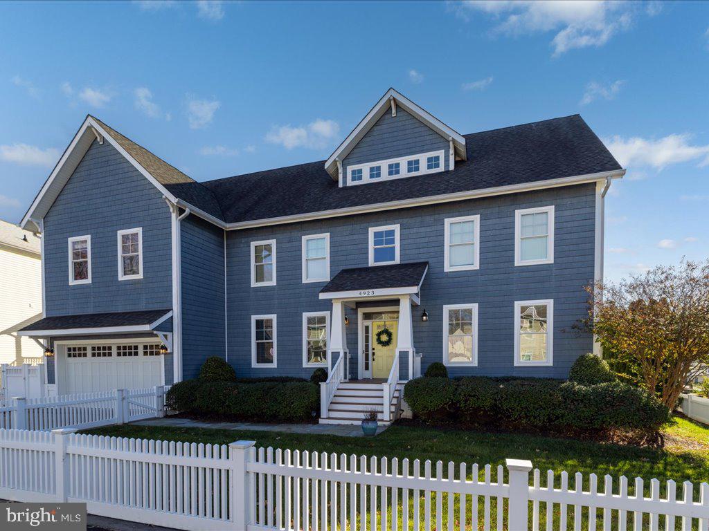 Located just an hour from Washington, D.C., this custom-built waterfront estate on Chesapeake Bay offers a rare blend of modern luxury, serene views, and premier water access, making it the perfect retreat or high-potential vacation rental. At nearly 5,000 square feet, this thoughtfully designed home captures the essence of relaxation and recreation along over 100 feet of pristine shoreline.
Built with gatherings in mind, this three-level residence features 4 spacious bedrooms and 4.5 refined bathrooms, making it a perfect choice for family vacations or group getaways. The main level showcases an open-concept design with soaring ceilings, rich maple hardwoods, and a striking stone-surround fireplace as the focal point of the living room—a welcoming feature for cozy evenings and gatherings. The gourmet chef’s kitchen is outfitted with premium stainless steel appliances, double ovens, a gas cooktop, and granite countertops, while an adjoining screened-in porch offers a peaceful, sheltered space to enjoy Bay views over morning coffee or evening drinks.
Each level of the home presents thoughtfully designed spaces for both entertainment and relaxation. The second-floor owner’s suite is a private sanctuary, complete with a spa-like bath, sitting area, bonus room, and a private balcony overlooking the Bay’s tranquil waters. Additional guest suites and a cozy den provide ample space for unwinding, while a main-level office offers a secluded retreat for work or planning the day's adventures.
The third floor is dedicated to entertainment, with a spacious family room featuring a wet bar, refrigerator, and balcony offering panoramic views—an ideal spot for sunset gatherings or lounging after a day on the water.
Outside, lush lawns lead to a custom pier with dual boat lifts, making water adventures effortlessly accessible. A private waterside entrance and full bath provide a convenient transition from outdoor fun to indoor comfort.
Perfectly positioned for vacation rentals, this move-in-ready property is within reach of local amenities like a marina, boat ramp, swimming beach, and popular waterfront restaurants accessible by boat. Whether as a private retreat or an income-generating rental, this property offers a luxurious Chesapeake Bay lifestyle with proximity to the city and high demand for a premium waterfront experience.