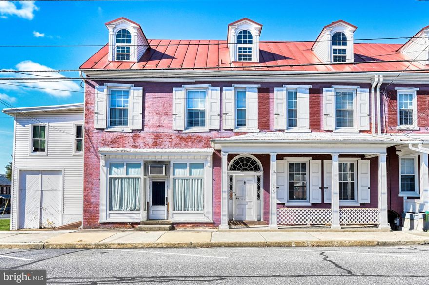 Homes like this just don't hit the market too often!  It has been in the same family for OVER 100 Years!  Offering incredible character and over 3000 sq ft of living space.  If walls could talk, this home would have a great story!    It comprised the original fire house in Bernville, then part of it became the Stanley Klopp Store.  Today, it is all part of the spacious home at 308 N Main St.  As you enter in, you are greeted by a large foyer.  To the right is the Living Room, to the left is the Family Room.  Towards the back of the home is the Dining Room, Kitchen and a full Bath.  The second floor has 4 nicely sized bedrooms and the home's second full Bath.  The beautiful staircase takes you from the main floor, right up to the third floor where you will find a large, walk up attic.  The lower level has a finished Rec Room with kitchenette, 2 Storage Rooms, a Workshop AND laundry area.,  You also have direct access into the yard from this level.  Outside you will see the Summer Kitchen, a porch, patio, level yard and the old firehouse door (storage garage today) attached to the left of the home.  There are two off street parking spaces in the lot behind the property that are assigned to this home.  It you are looking for large room sizes, amazing character and a little bit of history, THIS is the house for you!  Don't delay, please call to schedule your showing today!