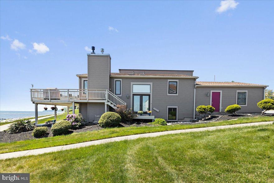 When it comes to WATERFRONT VIEWS you are not going to find much better than this SPECTACULAR LOCATION! Located just an hours drive to Washington DC, you  will never want to leave once you have sampled the sweeping 180 degree views of the  Chesapeake Bay!  You can  walk out to the waters edge in just 60 feet from your lower level. You can experience the rising sun  every morning. In turn key condition, you will find that most everything has been replaced or upgraded since 2017! Windows are Pella and Anderson Renewal for top of line quality.  Beautiful kitchen with huge island which seats 8 people all with tantalizing water views.  Hardwood floors adorn the main level  and the lower level features extra  high pile carpeting with  lux padding.   Two propane fireplaces keep you extra warm in the winter months. Every single room has water views!  Entertain in high style from your kitchen, deck off the family room with retractable canopy, or go to the  ground level and  enjoy your recreation room with stunning views and a great covered patio  to enjoy   yet even more views of the Bay.  The heat pump is less that 1year old and everything else looks  new! Enjoy walking to the Chesapeake Resort for dining, concerts, casino and much more.  Your water views will even beat the Resort Views.  You will have a community private sandy beach as well as a place to launch your kayak and storage.  Want pool privilege's?   Just dock your boat at the Resort and you have use of the indoor and outdoor pool.  Walk to Roland's Grocery store across the way and  enjoy the farmers markets, restaurants, shopping in North and Chesapeake Beach.  You have not seen anything like this before and this particular home sit's closer to the Bay than any the other homes in Chesapeake Station.  If you have been searching for just the right water property, look no further.!
