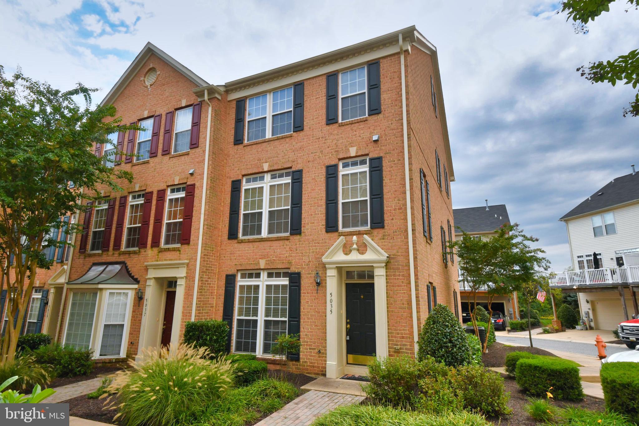 GORGEOUS BRICK 3 STORY EOG, 4 BEDROOMS w/LOFT 2.5 BATH TOWNSHOUSE IN HONEYGO VILLAGE. THE INVITING FOYER GREETS YOU WITH CERAMIC TILE FLOORING. FRENCH DOORS LEAD TO THE FIRST TUCKED AWAY BEDROOM WITH WALK-IN CLOSET. STUNNING KITCHEN INCLUDES NEW GRANITE COUNTER TOPS WITH BACK SPLASH, 42 INCH CABINETS, ISLAND WITH SEATING FOR THREE OPENS TO SPACIOUS DINING AREA FOR MORE FORMAL SEATING AND BEAUTIFUL HARDWOOD FLOORS. STAINLESS STEEL APPLIANCES. WALK OUT FROM KITCHEN TO THE LARGE MAINTENANCE FREE TREX DECK. PRIMARY BEDROOM SUITE INCLUDES VAULTED CEILING, WALK-IN CLOSET, UPDATED LUXURY BATH FEATURES DUAL VANITIES, SOAKING TUB, NEW CERAMIC TILE FLOORING, NEW HANDBUILT CERAMIC TILE SHOWER WITH NEW DOOR. COMFORTABLE LOFT OVERLOOKS THE SUNFILLED BEDROOM. FRESHLY PAINTED AND NEW CARPET PUTS THE FINISHING TOUCHES ON THIS TURN KEY HOME. 2 CAR GARAGE AND MORE. BUY NOW AND MOVE JUST IN TIME FOR THE HOLIDAYS. NESTLED CLOSE TO CONVENIENT SHOPS & RESTAURANTS, EASY ACCESS TO I95 & 695. CALL TODAY FOR YOUR PERSONAL TOUR!