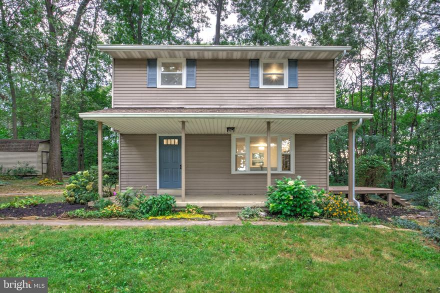 Welcome to 1540 Bahns Mill Rd in Windsor, PA — a beautifully updated home nestled on a peaceful, wooded 2-acre lot. This 3-bedroom, 1.5-bath home offers comfort, style, and space, making it the perfect place to call home. Step inside to discover new luxury vinyl plank flooring and a bright, open layout that seamlessly connects the living room, dining area, and kitchen. The kitchen is a true highlight, featuring sleek white cabinetry, stainless-steel appliances, a stylish tile backsplash, and a deep stainless-steel sink. Upstairs, you'll find three comfortable bedrooms, including a primary bedroom with its own private half bath, and a full shared bathroom. The finished lower-level basement adds valuable living space — ideal for a media room, home gym, or play area. Outside, unwind on the back deck while enjoying tranquil views of surrounding woods and distant farmland. Don’t miss this rare opportunity for privacy, comfort, and modern updates in a serene rural setting!