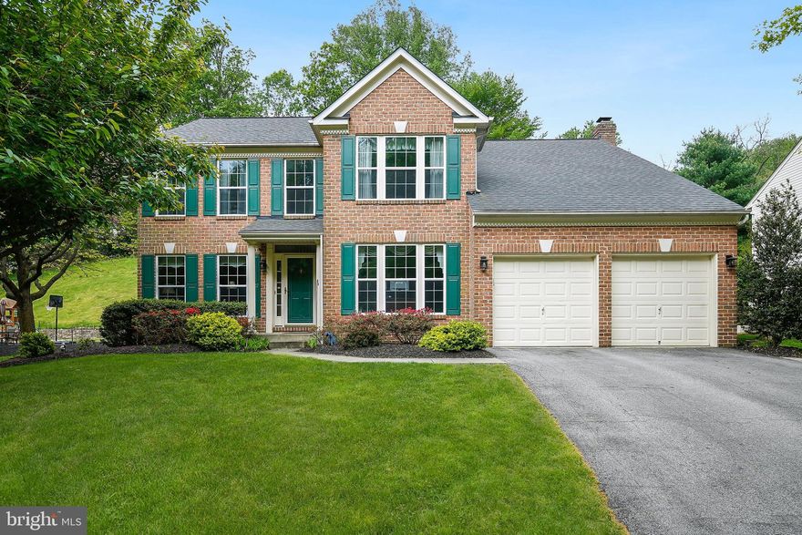 WELCOME HOME to this Exquisite Brick Front Colonial perfectly Situated on a Quiet Street in sought after WORTHINGTON of Ellicott City!  This 3600+ home is move in ready and waiting for you!  Brazilian Hardwood Floors grace the main level, and Stainless Steel Appliances, Granite Countertops and Island give the kitchen a warm inviting look.  Plenty of space to relax or entertain here, a cozy wood burning fireplace in the Family Room is just the spot on chilly nights.  Just off of the Family Room, step out to the inviting screen-in porch and Maintenance-Free Composite Deck overlooking a peaceful and professional landscaped backyard surrounded by Nature and Serenity.  Conveniently located on the main level is the Washer/Dryer, ½ bath, Formal Dining Room, and a Private Office/Library, perfect as a workspace if working remotely!  On the upper level, there are 4 Spacious Bedrooms and One Full Bath. Step up to a large light filled Primary Suite with a walk in closet and private area for an office or to expand the existing walk in closet along with a private en suite bath with Jacuzzi tub and double vanities.  The finished basement features an optional 5th bedroom with a full size bath with stand up shower.  Lots of storage throughout! Extras include:  WiFi enabled garage door opener, walking distance to school and bus stop, freshly mulched, recessed lighting throughout, hot water heater replaced in (2015), Trane HVAC (2015), Newer Gutter Guards, 30 year newer roof with a lifetime guarantee.  Centrally located to Ft. Meade, NSA, Baltimore and Washington, DC, minutes to Historical Downtown Ellicott City, and walking distance to Highly Rated Worthington Elementary and Worthington Dog Park.  NO HOA FEE or FRONT FOOT FEE!  Optional pool membership at $500/yr.!!  Hurry  - this one won’t last long!!