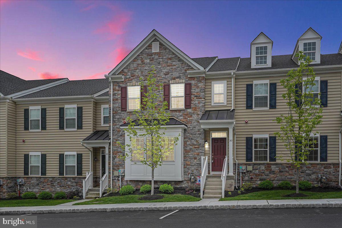 Welcome to your new home in The Reserve at Rose Tree community in the highly sought after Rose Tree Media school district. Why wait for new construction when this almost new home is ready and waiting for you? Built in 2018, this stone front home showcases hardwood flooring on the main level and open concept living for all of your daily and entertainment needs. The gourmet kitchen features stainless steel appliances, granite countertops, natural gas cooking, double wall ovens, a spacious island with seating for four, and an upgraded pantry with custom shelving and lighting. Rounding out the main level are the first of two living areas, a powder room, and easy access to the brick paver courtyard and the home's two car garage. The extra square footage in this particular home is noticeable, accomplished by a bump out in the main level living room. The upper level is where you will find the primary suite with soaring cathedral ceilings and en-suite bathroom, 2 additional extra deep bedrooms, a full hall bathroom, and the home's laundry area. The current owners have finished the lower level, adding a second family room/den, an additional bedroom, a full bathroom with marble vanity and wi-fi enabled heated floors, as well as a bonus room perfect for a home office, home gym, or a workshop. The community offers tons of amenities, including a playground, bocce court, gazebo, and sidewalks throughout, and is within a stone's throw of Media Borough, "Everybody's Hometown", where you will find a plethora of restaurants, bars, shops, and cultural events throughout the year. You will also have easy access to public transportation from nearby Media and Elwyn rail stations. Make your appointment today!