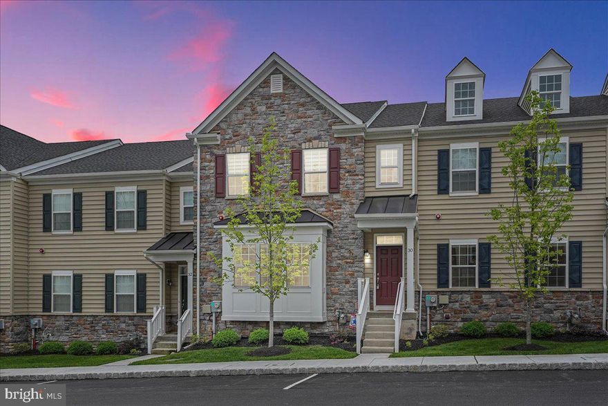 Welcome to your new home in The Reserve at Rose Tree community in the highly sought after Rose Tree Media school district. Why wait for new construction when this almost new home is ready and waiting for you? Built in 2018, this stone front home showcases hardwood flooring on the main level and open concept living for all of your daily and entertainment needs. The gourmet kitchen features stainless steel appliances, granite countertops, natural gas cooking, double wall ovens, a spacious island with seating for four, and an upgraded pantry with custom shelving and lighting. Rounding out the main level are the first of two living areas, a powder room, and easy access to the brick paver courtyard and the home's two car garage. The extra square footage in this particular home is noticeable, accomplished by a bump out in the main level living room. The upper level is where you will find the primary suite with soaring cathedral ceilings and en-suite bathroom, 2 additional extra deep bedrooms, a full hall bathroom, and the home's laundry area. The current owners have finished the lower level, adding a second family room/den, an additional bedroom, a full bathroom with marble vanity and wi-fi enabled heated floors, as well as a bonus room perfect for a home office, home gym, or a workshop. The community offers tons of amenities, including a playground, bocce court, gazebo, and sidewalks throughout, and is within a stone's throw of Media Borough, "Everybody's Hometown", where you will find a plethora of restaurants, bars, shops, and cultural events throughout the year. You will also have easy access to public transportation from nearby Media and Elwyn rail stations. Make your appointment today!