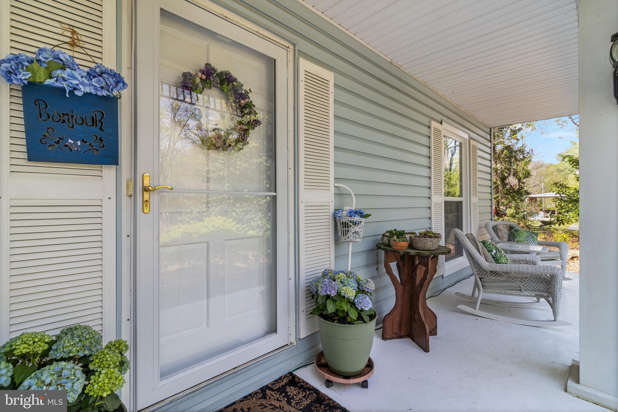 Located in Historic Port Tobacco, which is a five minute drive to downtown La Plata. You can walk to Waterfront Dining at the newly renovated Port Tobacco Restaurant. The Town of La Plata has all the conveniences with multiple choices for shopping, dining and services. This beautifully designed 4-bedroom, 2.5-bathroom Colonial, where classic charm meets modern comfort. Nestled among mature, meticulously maintained gardens, this home offers a serene retreat with stunning outdoor spaces perfect for relaxation and entertaining.
Step inside to find a tastefully decorated interior, featuring spacious living areas, gleaming hardwood floors, and abundant natural light. The gourmet kitchen boasts high-end appliances, elegant cabinetry, and a cozy breakfast nook overlooking mature trees, inviting an array of colorful visitors. The spacious family room provides a warm and inviting space for relaxation, while the formal dining room offers an elegant setting for special occasion
Upstairs, the primary suite provides a private oasis with a luxurious ensuite bath, while three additional generously sized bedrooms offer flexibility for family, guests, or a home office. A standout feature of this home is the full second-story balcony, perfect for morning coffee or unwinding in the evenings while overlooking the lush grounds.
With incredible curb appeal, a spacious backyard, a short walk to Port Tobacco River and thoughtful design throughout, this Colonial gem is truly a must-see. Schedule your private tour today!
All windows upgraded to new energy efficient double paned in January 2025. Heat pump replaced in 2024. Roof, gutters and downspouts replaced in 2023. Driveway replaced in 2023. EV 50 AMP charging outlet in garage.