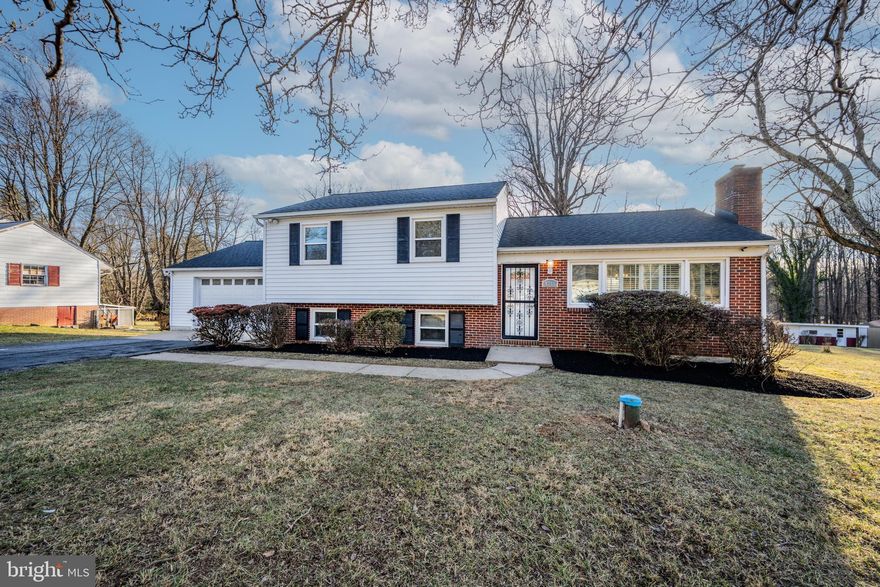 Fall in love with this expansive single family split-level home with a 2-car garage, approximately 2300 square feet, that features THREE (3) BEDROOMS and TWO (2) FULL BATHS, along with a spacious basement area and nice walkout patio that overlooks a large beautiful backyard in the picturesque and charming WINDSOR MILL COMMUNITY in Windsor Mill, MD.  Boasting the distinction of being one of the largest homes in the development, this residence sits on a 23,958 sq ft lot (0.55 acre) and offers an opulent blend of space and style.  With multiple bedrooms and bathrooms, this home unfolds with triple levels, offering an abundance of living space for your family's needs.  Gleaming hardwood floors in the living room and a timeless neutral color palette create an inviting ambiance that welcomes you home. The journey begins with the sun-drenched living room, leading you to an elegant dining room and a meticulously designed kitchen.  This culinary haven features a peninsula island with bar seating, beautiful quartz countertops, stainless-steel appliances, and a separate dining area. On the upper level, three (3) generously sized bedrooms await, providing ample space for rest and relaxation.  The home has undergone a comprehensive top-to-bottom modernization, leaving no detail unattended.  Designer accents, including recessed LED lighting, plush carpet, and a fully redesigned basement with plush new carpeting, enhancing the overall aesthetic.  Step onto the exterior patio, a true gem that seamlessly provides outdoor serenity.  Large windows grace the front of the residence, allowing natural light to flood the space.  A recently installed HVAC system and water heater ensures comfort and efficiency. Descending to the lower level, you'll discover an expansive recreation or living room space which also includes a convenient laundry room, and a well-appointed bathroom. This space can even be used for a daycare or business venture, with its own private entrance. Practical storage options are available in the basement, while a sizable shed in the backyard offers space for outdoor equipment and more.  Positioned at the intersection of Windsor Mill, Randallstown and Woodstock, this property provides a harmonious blend of tranquil suburban living and convenient access to urban amenities. Major thoroughfares like I-695 and I-795 and Liberty Road are within easy reach, streamlining your commute.  Don't miss the opportunity to make this remarkable residence your own.  With its generously proportioned layout, modern features, and desirable attributes, it offers a comfortable and spacious living experience.  Act swiftly to schedule a visit and secure your place in this exceptional home, as it is sure to find its new owner in no time.  Your dream home awaits! Seller prefers Assurance Title LLC (Columbia, MD) for title/settlement. Please write offers accordingly.