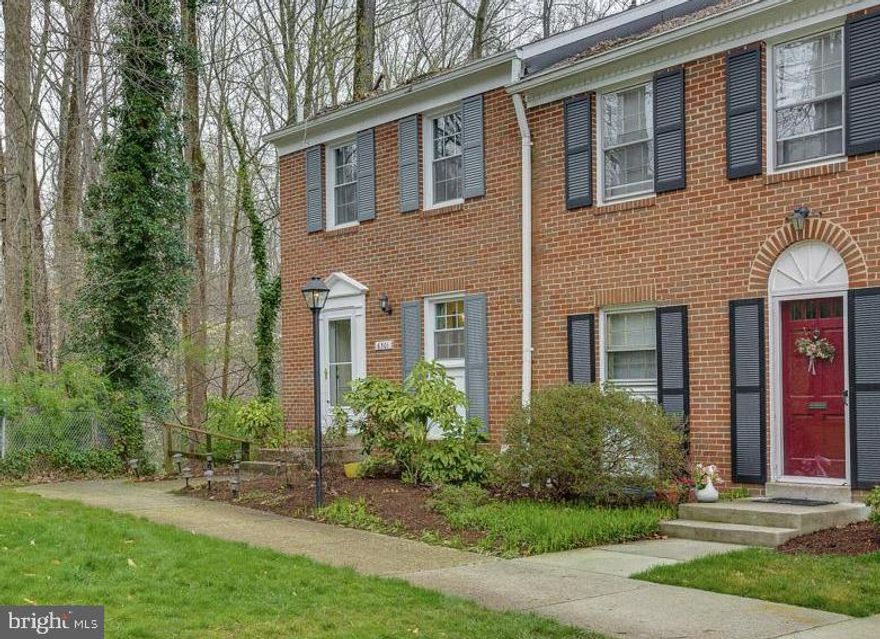 Stunning 3 level brick end-unit townhome w/totally remodeled kitchen and baths.  Must see!  Nestled in Cardinal Square with fantastic views of woods and Accotink Creek. Gorgeous hardwoods on main and upper level.  Redesigned kitchen includes stainless steel appliances, upgraded countertops, farmhouse sink, plenty of cabinet space and recessed lighting. Cozy wood burning fireplace in living room. Lower level features a large rec room, half bathroom, and large laundry/storage area. Walkout to fully fenced backyard and brick patio. Fantastic outdoor space amongst Mother Nature.  Updates include: New HVAC 2016. New roof 2017. New Washer and Dryer 2019. New front door and storm door 2020. Condo fee includes pool access, water, gas, sewer, trash.  1 assigned parking space right outside unit and 2 additional hang tags.  Close to 395/495/95, Slug Line, Metro Buses, Franconia Metro & Springfield Mall. Keene Mill Elementary, Irving Middle School & West Springfield High School.  Welcome Home!