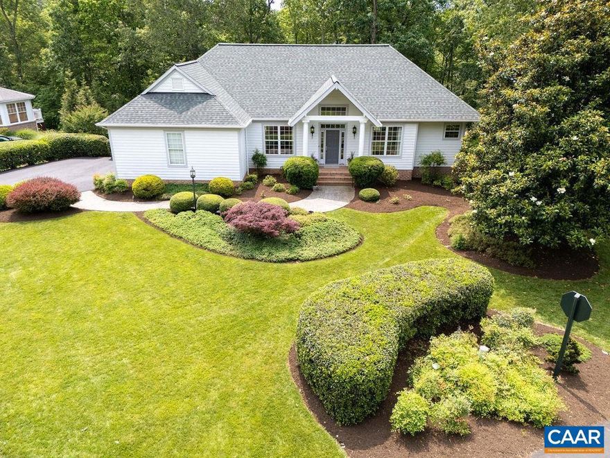 A Glenmore gem. Architecturally stunning three bedroom custom residence built by Vito Cetta of Weather Hill Homes, with interior design influences by Heidi Brooks. Set on a lush and meticulously landscaped lot with front, back, and side yards, the home enjoys a backdrop of acres of wooded privacy.The main level is simply stunning and features high ceilings and warm natural light. Enjoy a  luxurious main level primary suite with bay window sitting area and 2 custom wardrobes. The  very comfortable walkout terrace level offers two additional bedrooms, a full bath, home office, crafts room and ample storage space, all with  lush views of the private back yard. It is a welcoming and very comfortable walkout Terrace level. Two convenient doors to access the back yard and pation. Recent upgrades include a brand-new roof, new gas furnace and HVAC system, and an expanded rear deck by DAKS. Gorgeous picture windows fill the home with natural light, and 3/4-inch oak hardwood floors span the main level. Interior highlights include custom arched cased openings, built-in bookcases, and two beautifully designed wardrobes in the primary suite. This home has been exceptionally well maintained and offers a luxurious and serene setting.,Granite Counter,Painted Cabinets,Solid Surface Counter,White Cabinets,Wood Cabinets,Wood Counter,Fireplace in Family Room