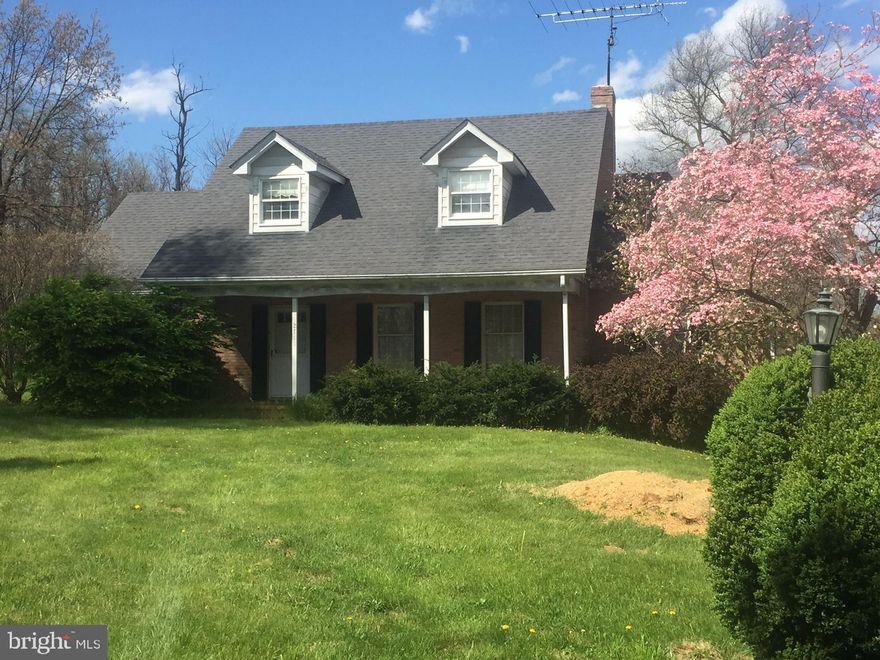 Beautiful home and on 5+ ac. in beautiful rural setting in scenic north east Frederick County minutes from I-81 and convenient to Rt.7, hospital and downtown Winchester. Classic character with high quality materials and construction of decades past. Newly and completely renovated and updated. New kitchen features maple cabinetry, granite counters and island, and tile flooring. New baths, new roof, new heat pump, newly painted throughout, new exterior siding, updated modern lighting and hardware throughout  Beautiful hardwood floors throughout. Main level features spacious living room, cozy den, dining room and primary bedroom suite. Lower level features living/entertainment room, half bath, workshop/storage room with secure vault storage, and one car garage. Second floor with three bedrooms, full bath, and two walk-in attic storage or potential additional bedroom or finished space. Detached two-car garage with loft.