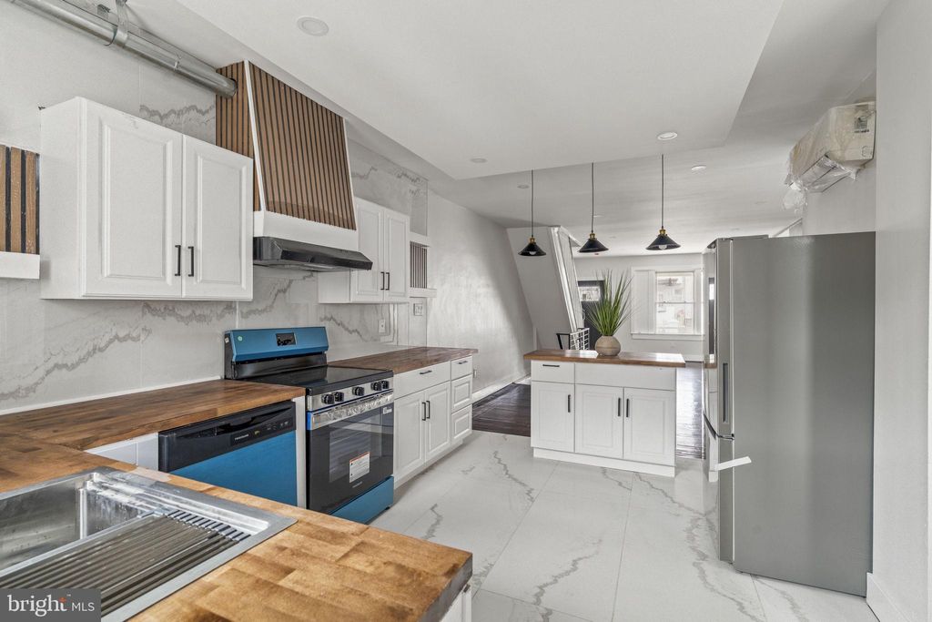 Photo of 4935 N 8th Street, PHILADELPHIA, PA 19120 (MLS # PAPH2569704)