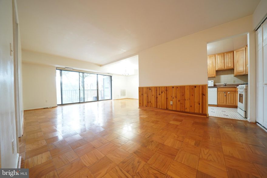 Available for immediate move in! Easy online application. Two bedroom large unit with  hardwood floors throughout. Neutral paint, very clean. Updated kitchen with granite counters, updated tile bath. Open plan with bedrooms separated at opposite ends of unit. Top floor so no noise overhead. Big sliding doors to patio. Washer/dryer in unit. Great location near beltway, two assigned parking spaces, storage unit, visitor pass. Gas, water, sewer, and trash are included. Use COVID precautions.