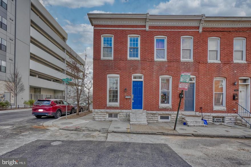 This 2-bedroom, 2-full-bath end-unit home in Federal Hill features hardwood floors throughout the main level and new carpet on the second floor. The primary bedroom includes an en suite bathroom, while the second bedroom offers access to a private walkout deck. The main level has an open layout highlighted by a wide wrought-iron staircase. A rear parking pad makes parking a cinch, with plenty of additional guest parking available on the side and front of the home. Conveniently located near local universities and all that Federal Hill has to offer.