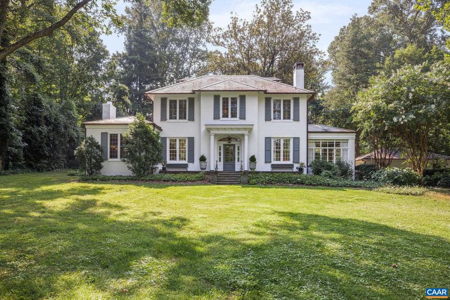 Introducing Magnolia Hill, a timeless home set back off one of Charlottesville?s most sought-after streets in the heart of the Barracks/Rugby neighborhood. This classic property has been thoughtfully updated to offer modern comfort while preserving its original character. The kitchen features custom cabinetry, a large center island, and top-tier appliances, connecting easily to multiple living and dining areas. Main and second-floor primary suites provide flexibility for everyday living or hosting guests. A detached guest cottage includes a bedroom, full kitchen, bath, and dedicated home office?perfect for visitors or working remotely. Outdoor living is just as inviting, with bluestone patios, a saltwater endless pool, fire pit, sport court, and dining area, all surrounded by mature landscaping. Just minutes from UVA and downtown, in one of the city's most established and desirable neighborhoods.