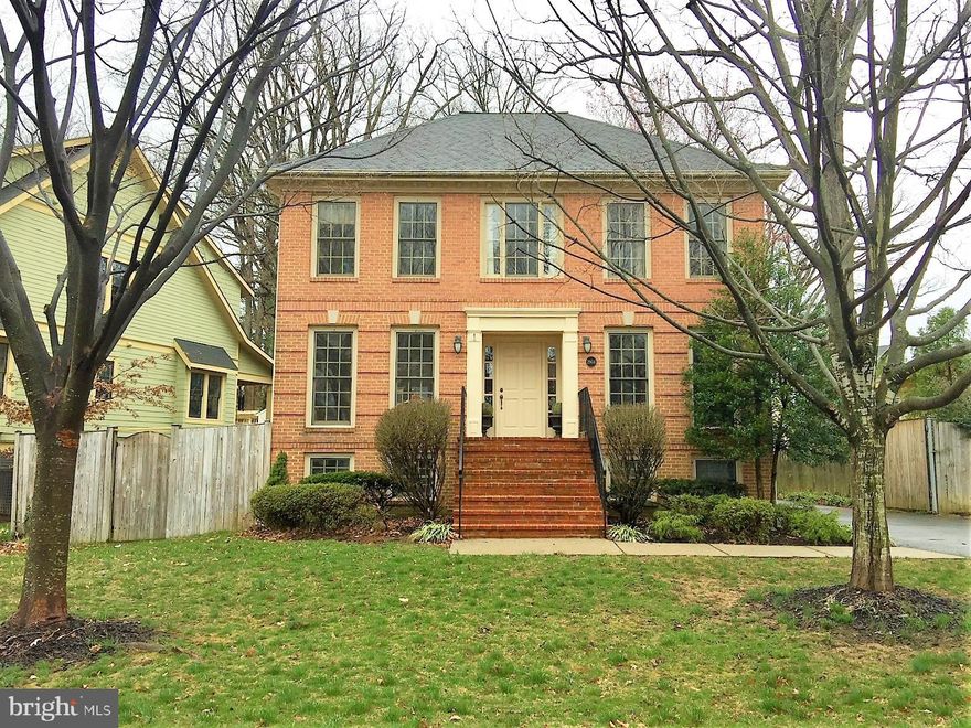 Miraculous & Palatial 5 Bedroom 3.5 Bathroom Colonial Directly Across From Lyon Park * Lawn Care & Some Furniture Included - 2 Flat Screen TV's, TV Stand & Sectional Couch In Basement * Sun-Filled & Open Concept Floorplan * Gleaming Hardwood Floors On Main Level * Spacious Kitchen With White Cabinetry, Stainless Steel Appliances, Island, Loaded With Countertop Space, & Breakfast Area With Bay Window * Cozy Living Room With Wood-Burning Fireplace With Custom Mantle, & French Door Leading To Large, Rear Deck - Perfect For Entertaining * The Deck Overlooks The Detached 2-Car Garage & Fenced Yard * Formal Dining Room With Crown Molding * Spacious Upper Level Bedrooms * Master Suite With Walk-In Closet & Custom Shelving & Master Bathroom With Deep, Soaking Tub & Dual Sinks * Lower Level Recreation Room With Built-In Shelving & Cabinets, Wet Bar, & Walk-Up Stairs To Rear Backyard * Recessed Lighting * Easy Commute To DC, Pentagon, Ballston & Rosslyn * < A Mile To Clarendon Metro *