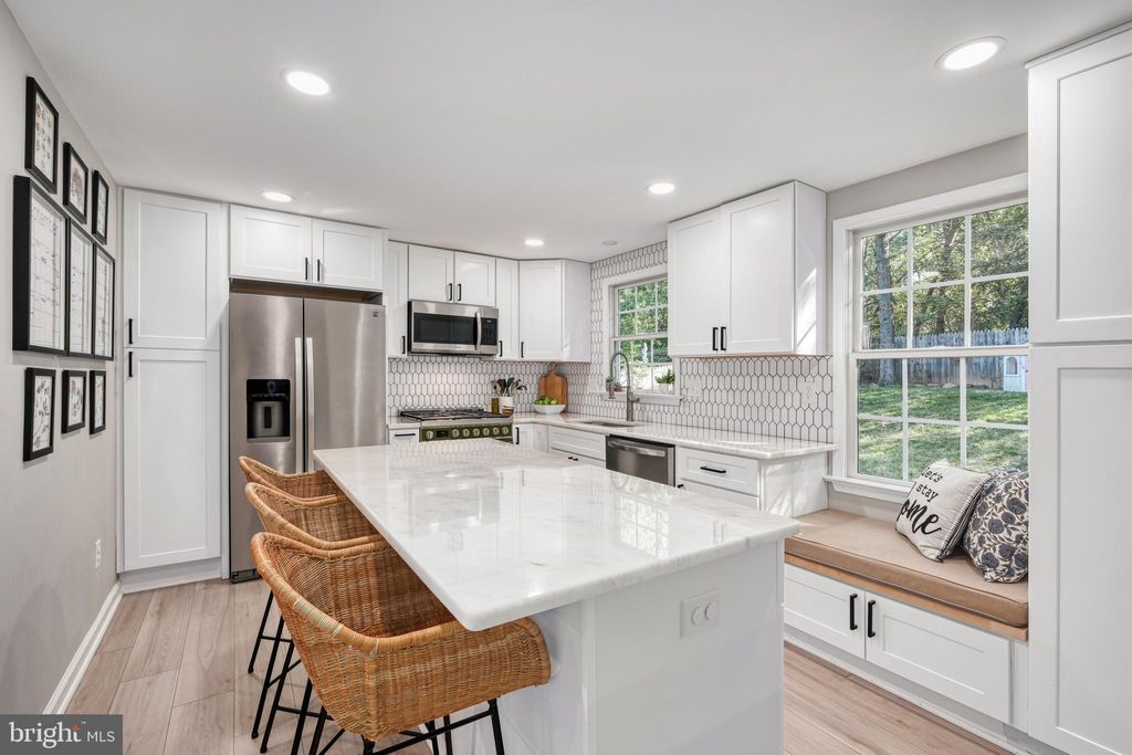 Photo of 5055 Kenerson Drive, FAIRFAX, VA 22032 (MLS # VAFX2278122)