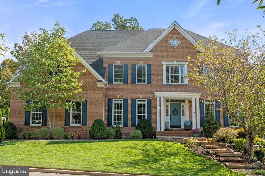 Welcome to this lovely North facing 4+ bedroom, 4.5 bathroom house in the South Riding area. The Sellers have diligently maintained their 5,800 SF home on a spacious .28 acre lot, investing six figures of upgrades inside and out. Offering a free flowing, sensible floor plan, this Winchester Randall model is the perfect blend of functionality and coziness, featuring solid hardwood floors on the entire main level, both staircases, and upstairs hall. The large refreshed, eat in kitchen offers a granite island counter with gas burners, double wall ovens, enormous pantry and endless cabinet space. The inviting screened in porch is conveniently accessible from the kitchen through sliding glass doors. The two-story family room features an eye-catching wood burning stone fireplace that is the focal point of the main level. Move upstairs using one of two staircases to the expansive primary suite offering two custom built walk in closets and a dressing area. The large fully remodeled primary bath features a soaking tub and roomy shower with two separate sink vanities and a private water closet. Spacious secondary bedrooms include a refreshed ensuite full bath for bedroom 2, and a fully remodeled (2024) Jack-and-Jill bath for bedrooms 3 and 4. 
The finished walk-out basement offers a large rec room, theater room (without platform seating for dual use), an optional fifth bedroom, full bath, and plenty of storage. New owners can enjoy indoor luxury and outdoor living at its finest in their beautiful flat backyard complete with screened in porch, deck and handsome stone patio. Tall trees in the open space offer an additional privacy buffer from backyard neighbors. The in-ground sprinkler system will keep the yard looking fresh and green all summer.
This lovely community offers a pool, playing fields, tennis courts and two playgrounds as well as miles of wooded, paved walking trails. This home is conveniently located close to major commuter routes, shopping, restaurants, and entertainment, many within walking distance. This address is currently zoned for the Freedom HS, Lunsford, MS and Little River ES pyramid. Numerous nearby preschools, day care facilities and private schools (including Paul VI) abound. Agent/Owner.