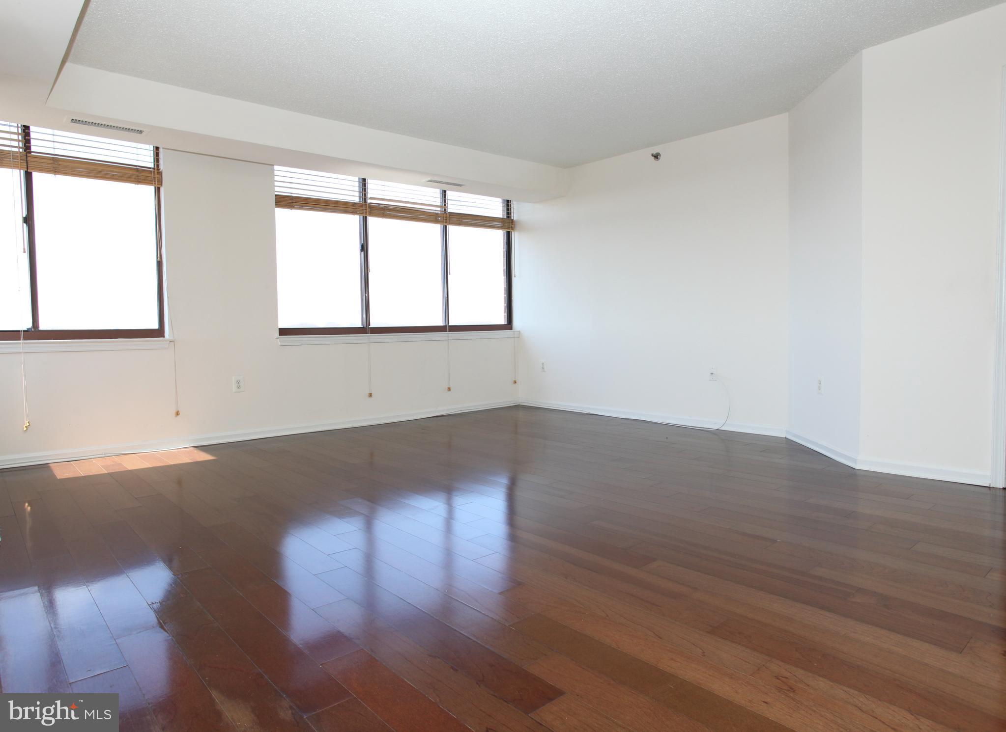 Stunning 2 bedroom 2 bath amenity filled condo building located at 10101 Grosvenor Place. This unit sits high above the tree line on the 17th floor. Enjoy panoramic vies of the downtown Bethesda, and DC on a clear day. The property includes 2 assigned parking spaces. Unit features wood floors, modern baths, updated kitchen with stainless and granite counters. New carpet in bedrooms, Large sun splashed living area. The building has its own fitness center, pool, front desk and secured parking garage. 10101 is close to the metro, shops, mall, rockville, beltway entrance, and DC. No smoking, no pets.