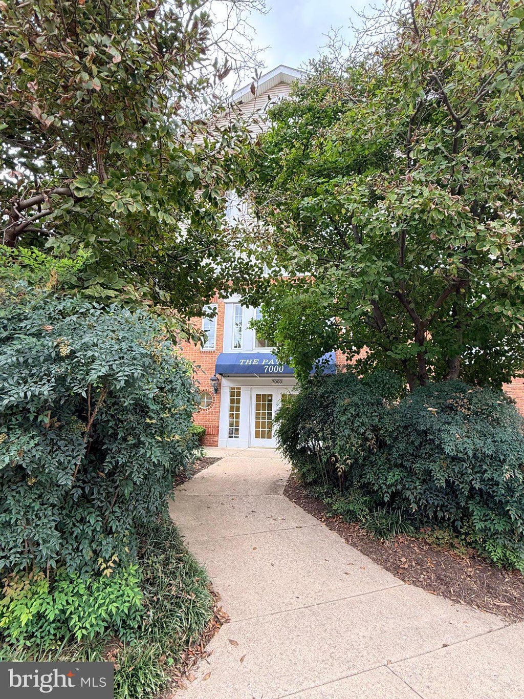 Photo of 7000 Falls Reach Drive #203, FALLS CHURCH, VA 22043 (MLS # VAFX2342198)