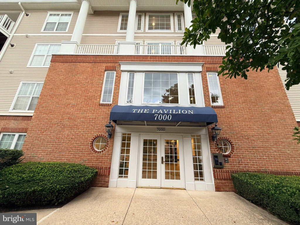 Photo of 7000 Falls Reach Drive #203, FALLS CHURCH, VA 22043 (MLS # VAFX2342198)