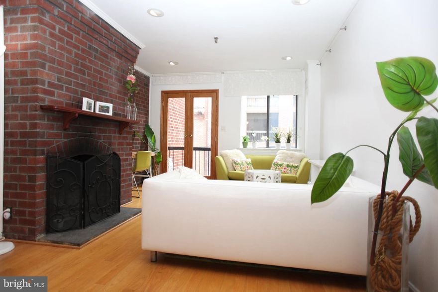 1 Year lease min. Sensational 2 bedroom 1 bath townhome in the sought after community of the Papermill Condominiums. This 2 bedroom 1 bath ( unfurnished ) row home has been updated and will be ready for move in come June 15, 2025. Furniture is staged.  Located in the heart of Georgetown this unit has wood floors, small balcony, 2 bedrooms, 1 updated bath, updated kitchen, w/d in unit and underground garage parking ( 1 space included in rent ). Fireplace is decorative. A community pool is available for use to tenants. No pets.