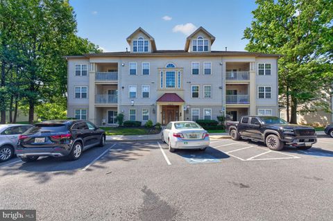 Photo of 11812 Eton Manor Drive #104, GERMANTOWN, MD 20876 (MLS # MDMC2239256)