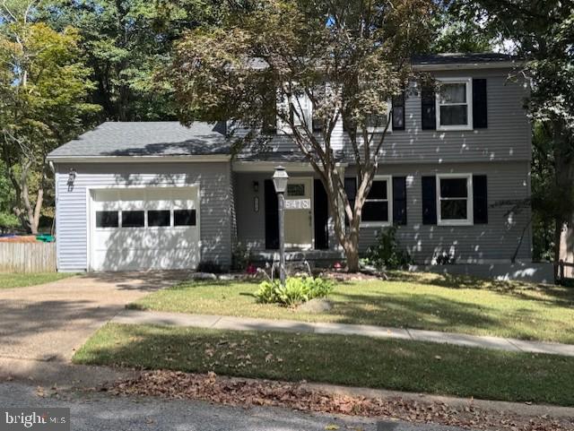 Coming soon in Columbia! This colonial-style detached home offers four bedrooms, three full bathrooms, and one half bath. The interior features a blend of luxury vinyl plank, ceramic tile, and solid hardwood flooring. The traditional floor plan highlights crown moldings, upgraded countertops, stainless steel appliances, and a bar, creating a great space for both everyday living and entertaining. Enjoy the comfort of central A/C and the convenience of an attached garage.