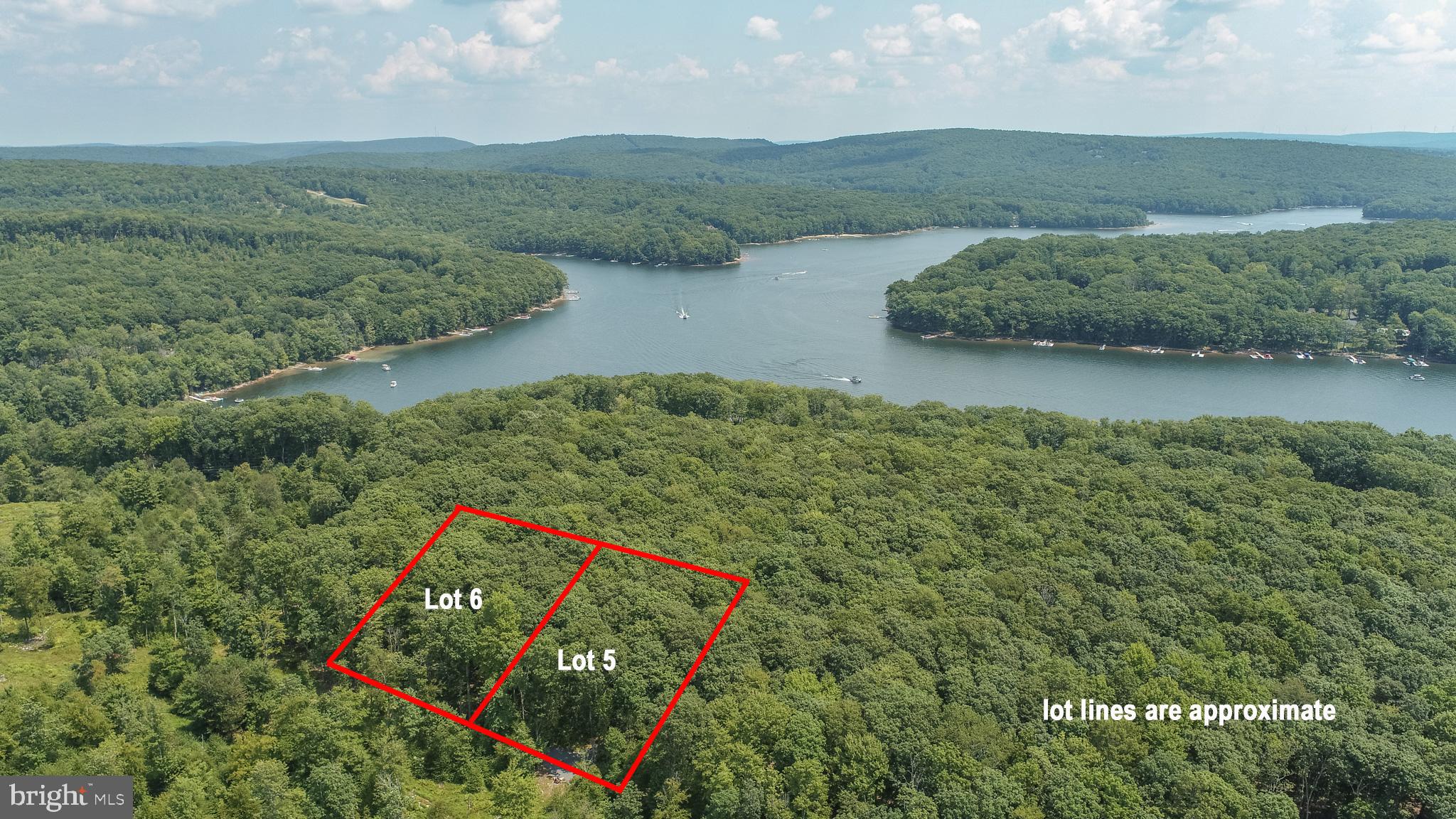 Tucked under a lush tree canopy amidst a backdrop of majestic hardwoods and blue sky, this 1.74-acre building lot is a tranquil sanctuary from the outside world! Â Exceptional location in the heart of the Deep Creek Lake area, near the end of a no-outlet private road, and just minutes from Wisp Ski & Golf Resort, Adventure Sports, GC Community Aquatics & Recreation Complex, Lodestone Golf, State Parks, theatres, shopping, dining, and all the resort fun. Â Design your new home to blend seamlessly with the natural habitat of this enchanting home site.
