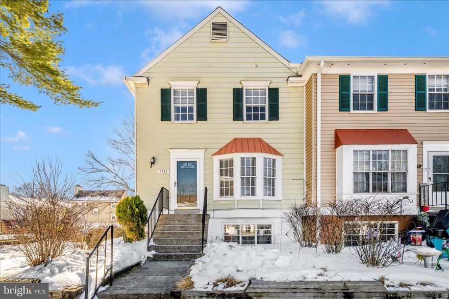 Welcome home to this inviting 3 bedroom, 2.5 bath end-unit townhome in the heart of Crofton Mews. Recently updated and move-in ready, this home offers a warm, comfortable layout designed for everyday living.

The main level features a bright kitchen with table space, stainless steel appliances, and a quartz countertop, opening to a spacious living and dining area anchored by a cozy wood-burning fireplace. It is an ideal space for relaxing evenings or hosting friends and family.

Upstairs, the primary suite includes a private bath and dual closets, while additional bedrooms and an updated hall bath complete the upper level. The lower walkout level leads directly to a fenced backyard with a brick patio, offering easy outdoor enjoyment and a pet-friendly setup with a built-in doggy door. This area is not a full basement but provides valuable access to the yard.

Enjoy community amenities including a swimming pool, one assigned parking space with ample guest parking, and the convenience of water and sewer included in the condo fee. A well-maintained home in a desirable location, ready for its next chapter.